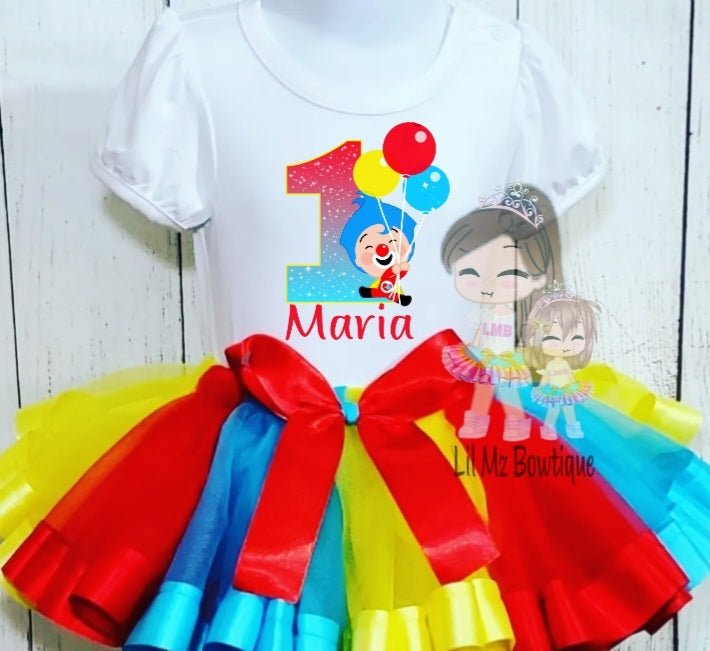 Clown theme tutu outfit with colorful tulle skirt and white shirt featuring birthday number and balloons design