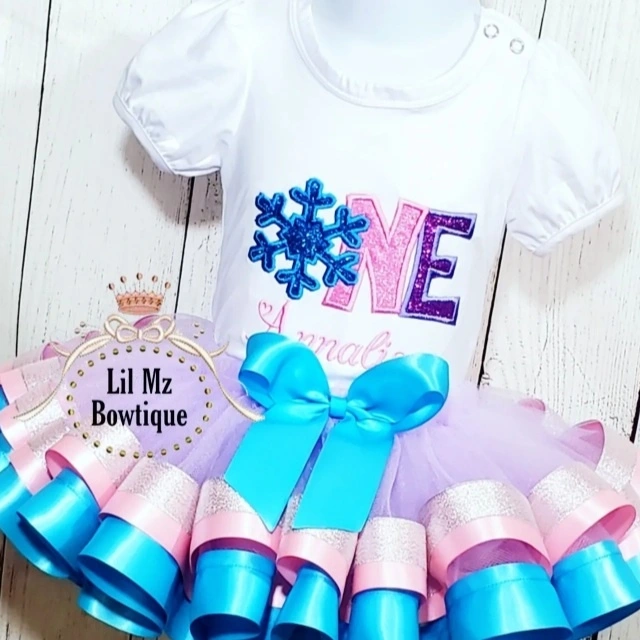 Snow Flake 1st Birthday Tutu Outfit with snowflake embroidery and pink and blue tutu skirt for babies