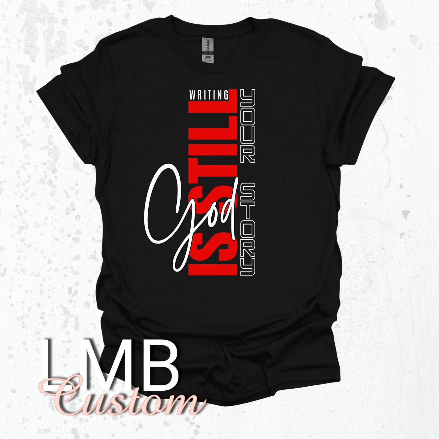 Christian adult t-shirt black with red and white "God is still writing your story" design, soft cotton blend