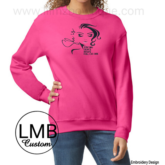 Pink Embroider She is Strong adult sweatshirt with bold graphic design